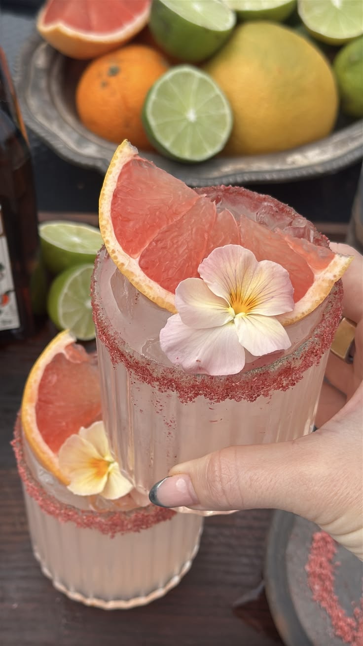 Fresh floral garnishes and light spirits used in spring cocktails